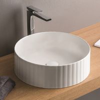 Товар: Раковина Artceram Millerighe накладная цвет матовый белый OSL010 05 00 - фото 1 Раковина Artceram Millerighe накладная цвет матовый белый OSL010 05 00 — фото 1, Раковины накладные